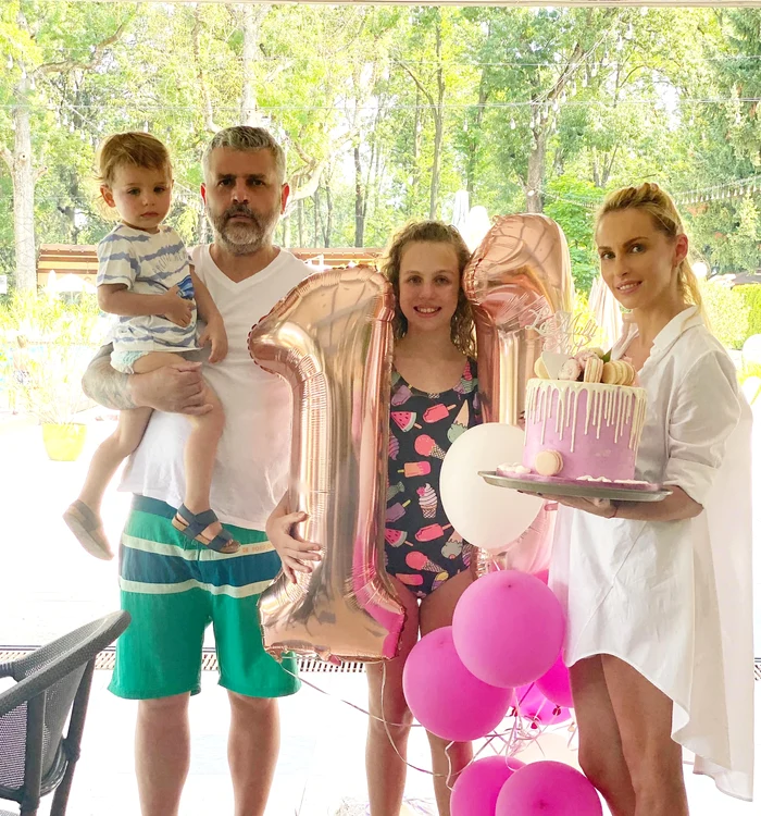Andreea și Sorin, alături de cei doi copii ai lor