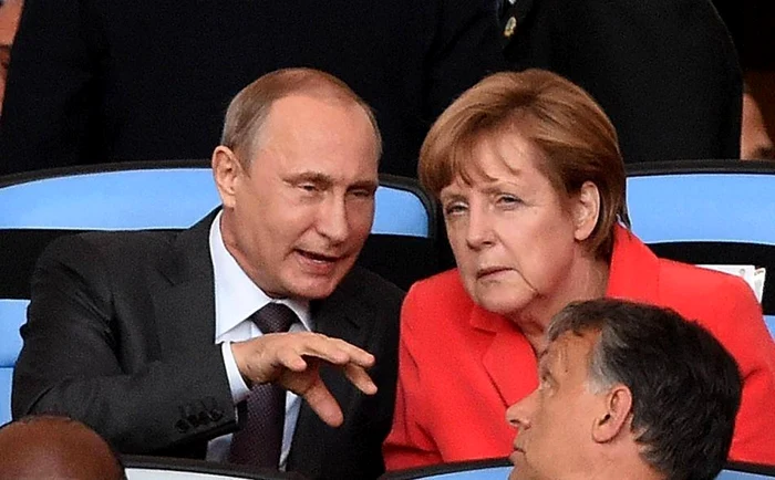 Pre;edintele rus Vladimir Putin şi cancelarul german Angela Merkel