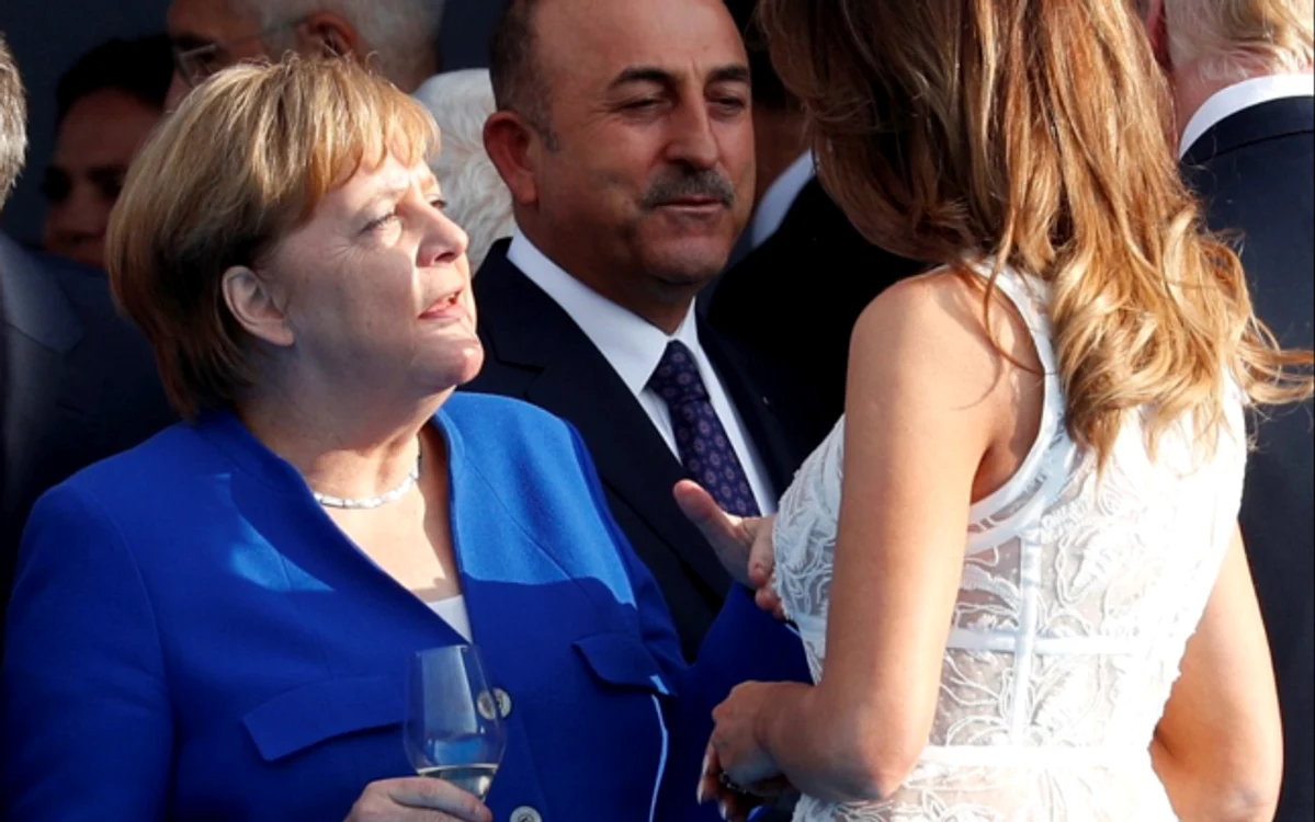 Angela Merkel, la un pahar de vin cu Melania Trump.