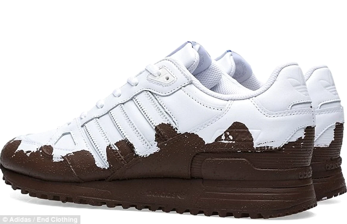 Modelul de pantof „murdar“ de la Adidas se alătură unui nou trend vestimentar, „moda fără stres“, care a început să se bucure de succes în rândul tinerilor noncoformişti. FOTO Daily Mail