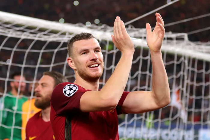 Dzeko se bucură alături de căpitanul De Rossi pentru o calificare fabuloasă în semifinalele Ligii Campionilor