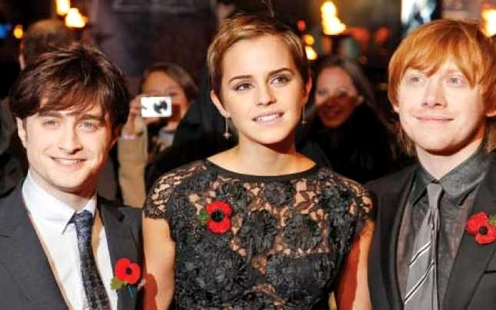 Daniel Radcliffe (stânga), Emma Watson şi Rupert Grind
