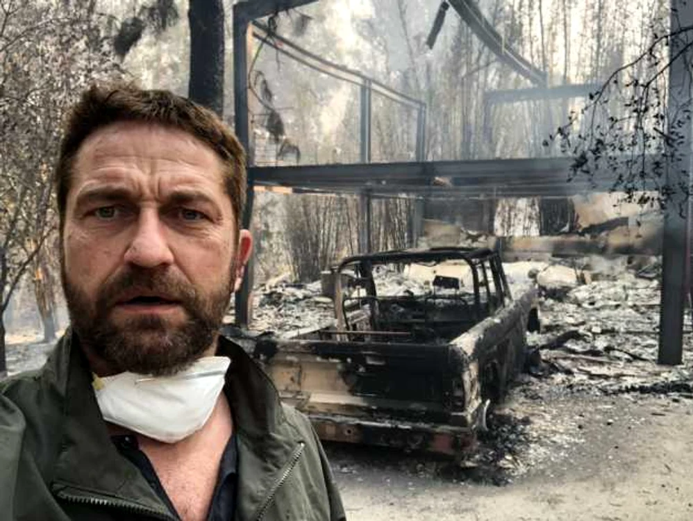 Casa arsa Gerard Butler Foto Arhiva personala