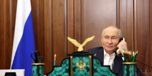 Putin   la telefon cu un copil de Crăciunul ortodox foto epa efe jpg