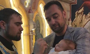 Smaranda, în brațele nașului Radu Budeș jpeg