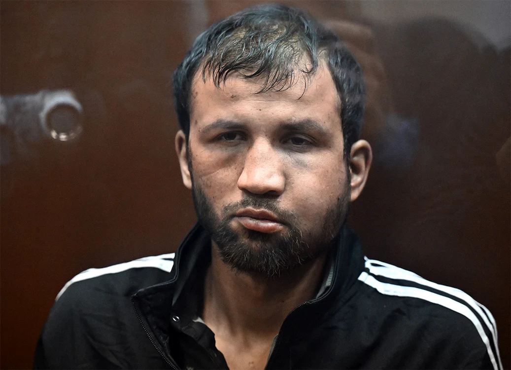 Bătut bine, un terorist avea o falcă umflată. FOTO: Profimedia