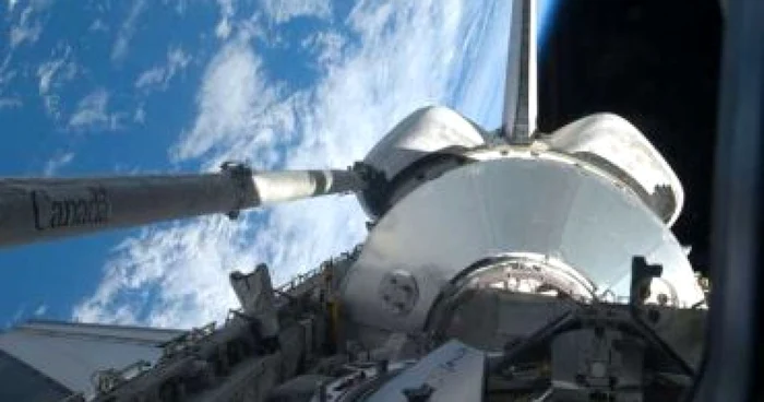 Prima ieşire în spaţiu pentru doi astronauţi de pe Discovery