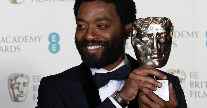 Chiwetel
Ejiofor, câştigător la categoria Cel mai bun actor pentru rolul
din filmul „12 ani de sclavie“
FOTO Reuters