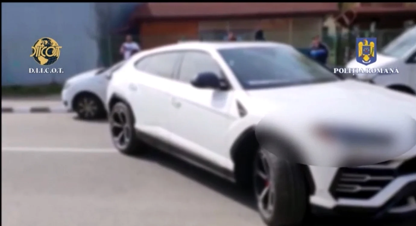 Mașinile de lux confiscate din Râmnicu Vâlcea de DIICOT FBI și IRS Sursă captură video DIICOT 