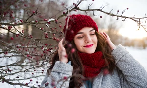 portrait gentle girl gray coat red hat scarf near branches snowcovered tree jpg