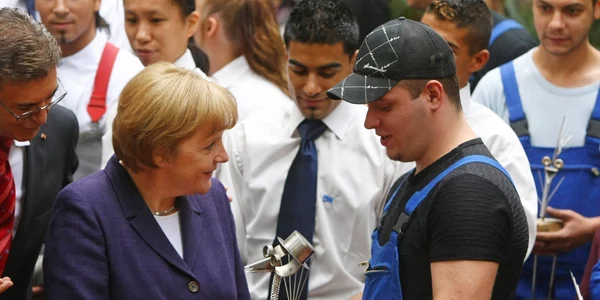 Angela Merkel in vizita la un centru de imigranti GettyImages/Gulliver