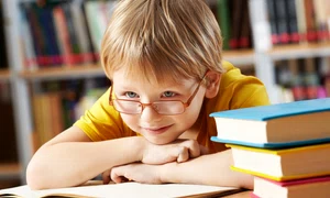 little boy smiling library jpg