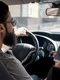 man using mobile phone while driving jpg