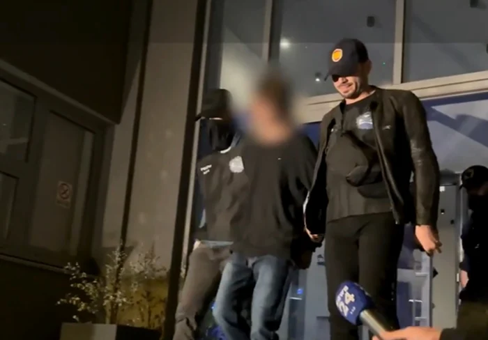 Tânărul care a trimis sute de mesaje de amenințare a fost reținut. Foto: captură video