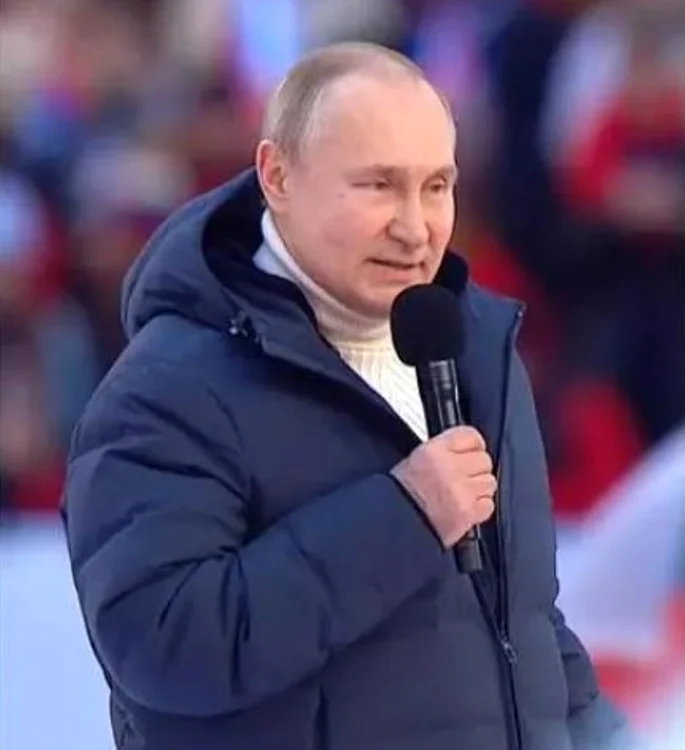 Vladimir Putin, cu geaca italiană peste vesta antiglonţ, în martie 2022. Foto arhivă