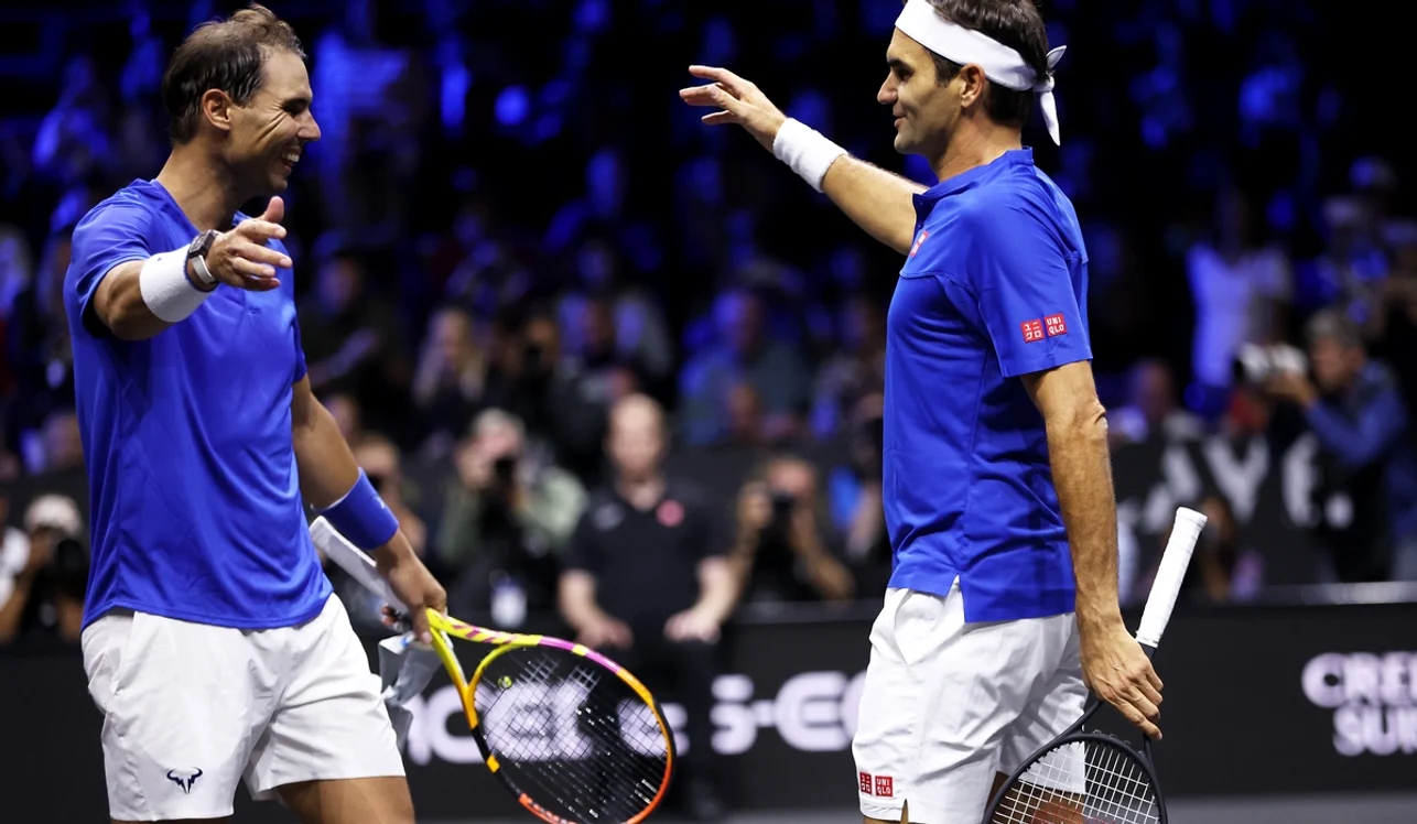 Nadal (stânga) și Federer au făcut echipă, în ultimul meci al elvețianului (FOTO: Getty Images)