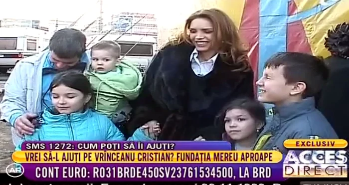 Cristina Spătar (43 de ani), alături de familia nevoiașă