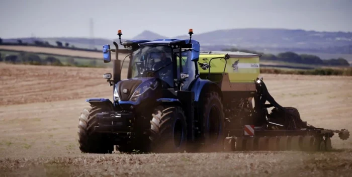 Tractorul care se alimentează cu gunoi de grajd.