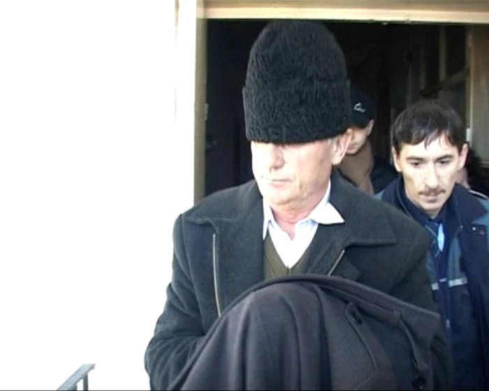 Dumitru Leșovschi a fost ridicat din sediul firmei cu cătușele la mâini