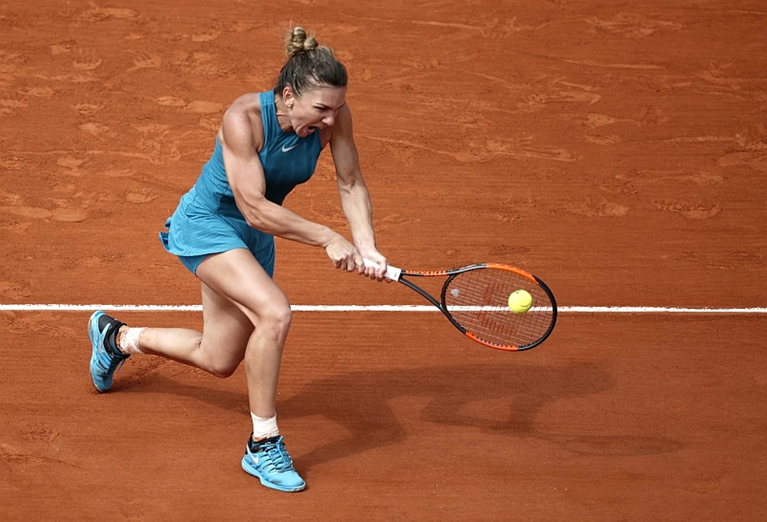 
    Simona Halep a jucat într-o ținută turcoaz la ParisFoto: EPA  