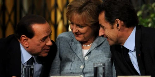 Silvio Berlusconi, Angela Merkel şi Nicolas Sarkozy