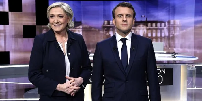 Marine Le Pen si Emmanuel Macron inainte de dezbaterea televizata pentru al doilea tur al alegerilor din Franta FOTO AFP