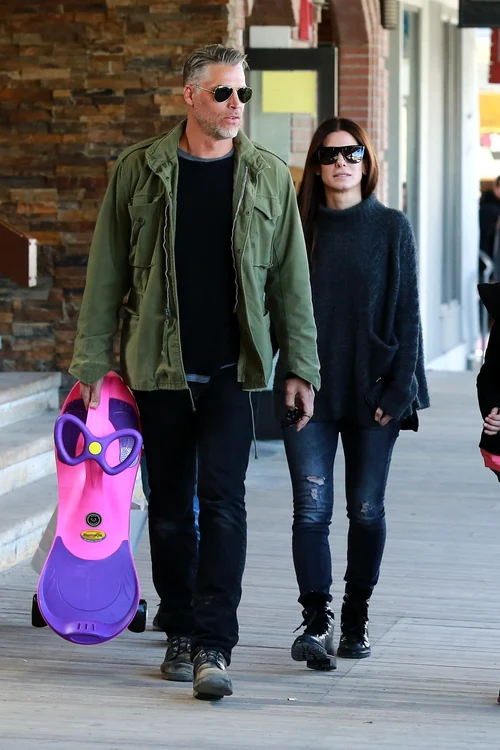 Exclusive    Premium: Sandra Bullock & Bryan Randall Out Shopping In Wyoming ***NO USE W/O PRIOR AGREEMENT   CALL FOR PRICING*** jpeg