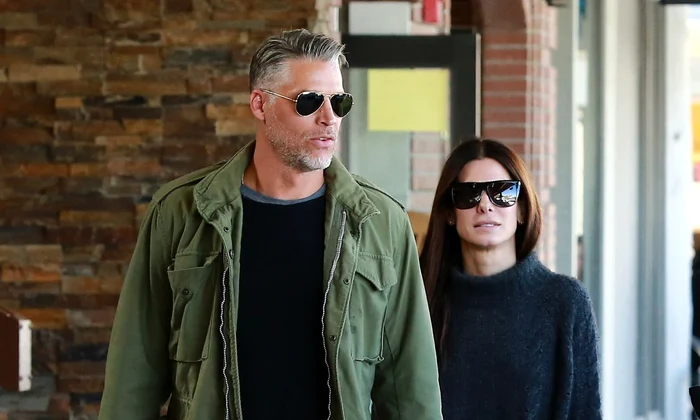 Exclusive    Premium: Sandra Bullock & Bryan Randall Out Shopping In Wyoming ***NO USE W/O PRIOR AGREEMENT   CALL FOR PRICING*** jpeg