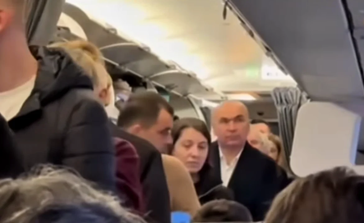 Ilie Bolojan a mers la summitul european cu un avion de linie FOTO Captură video