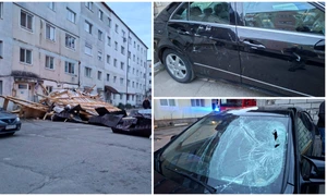 Acoperișul unui bloc a fost smuls și aruncat peste patru mașini parcate în fața unui bloc din Bistrița FOTO Facebook Mesager24.ro