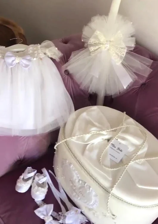 Trusoul aleși de nași pentru micuța Iris