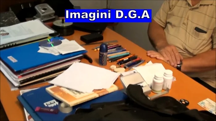 Ofiţerii DGA au găsit 2.000 de euro în biroul lui Ioan Ardelean. FOTO Captură video / DGA Interne MAI