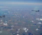 Două bombardiere strategice americane antrenamente comune deasupra României cu avioane ale Forţelor Aeriene Române FOTO MApN