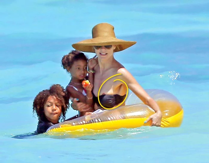 Fotomodelul german s-a distrat împreună cu copiii pe o plajă din Bahamas