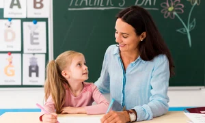 teacher looking her little student jpg