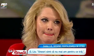 Oana Lis, cu un bebeluş în braţe jpeg