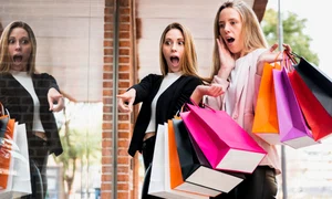 surprised girls with shopping bags looking window jpg