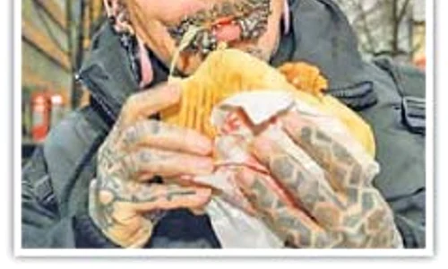 Germanul are  cele mai multe  piercinguri din lume jpeg