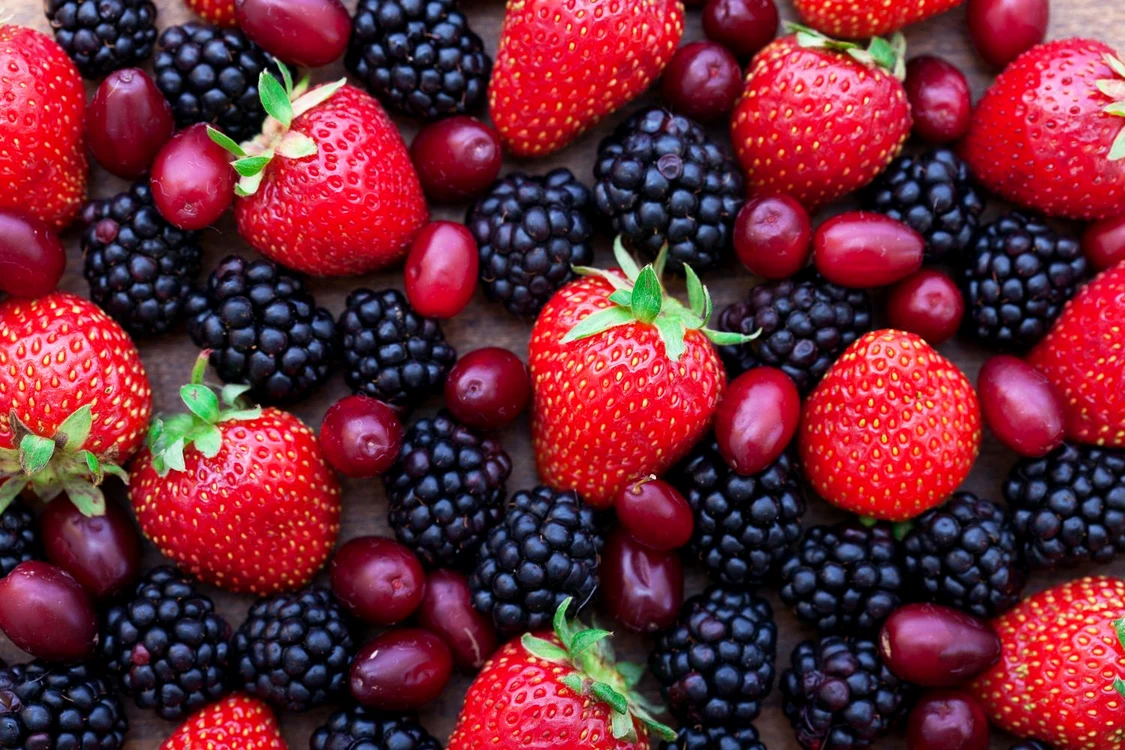 Berries, summer fruit on wooden table jpeg