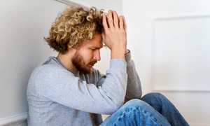 medium shot man praying floor jpg