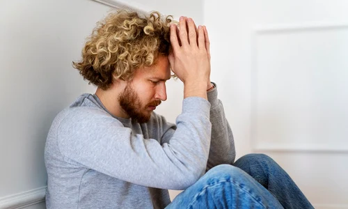 medium shot man praying floor jpg