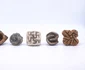 Mtrițe de teracotă probabil folosite pentru a decora sau marca pâinea în timpul coacerii (© Università di Catania)