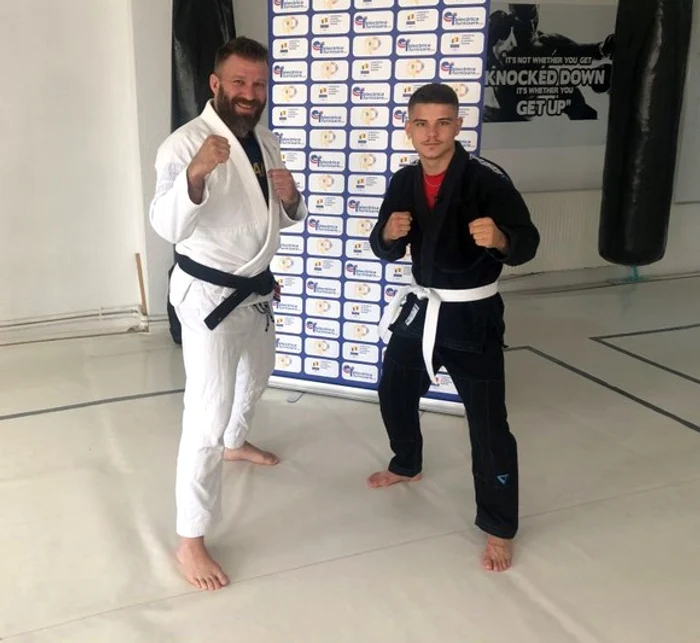 Cosmin Gîrleanu, alături de instructorul Ciprian Cărăușu