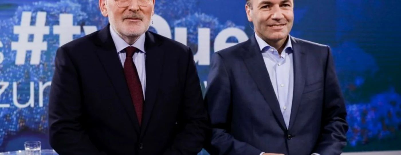 Social democratul Fras Timmermans şi popularul Manfred Weber