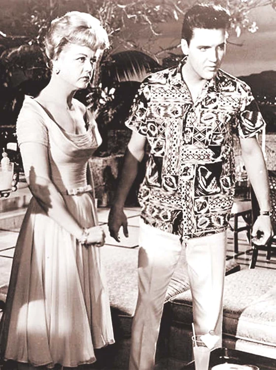 1961. Joacă alături de Elvis Presley  în filmul  Blue Hawaii 