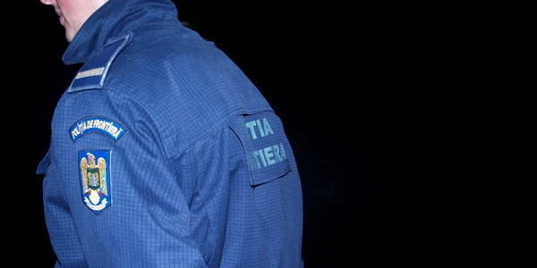 Un poliţist de frontieră a intrat în flăcări pentru a salva o domnişoară de 20 de ani 