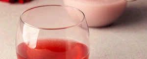 close up hand holding bottle jpg