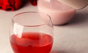 close up hand holding bottle jpg
