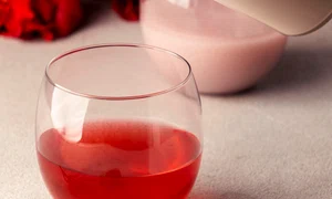 close up hand holding bottle jpg