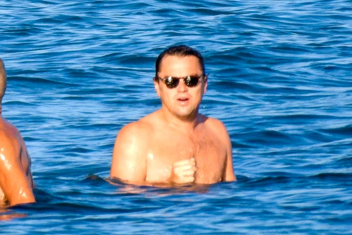 Leonardo Dicaprio appears self conscious when spotted shirtless in Malibu jpeg